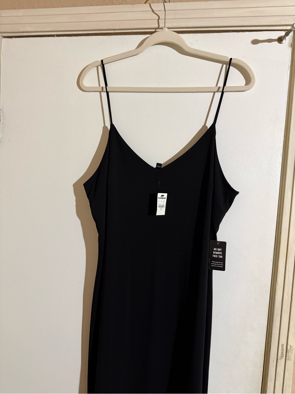 Express Black Tag on Black Garment